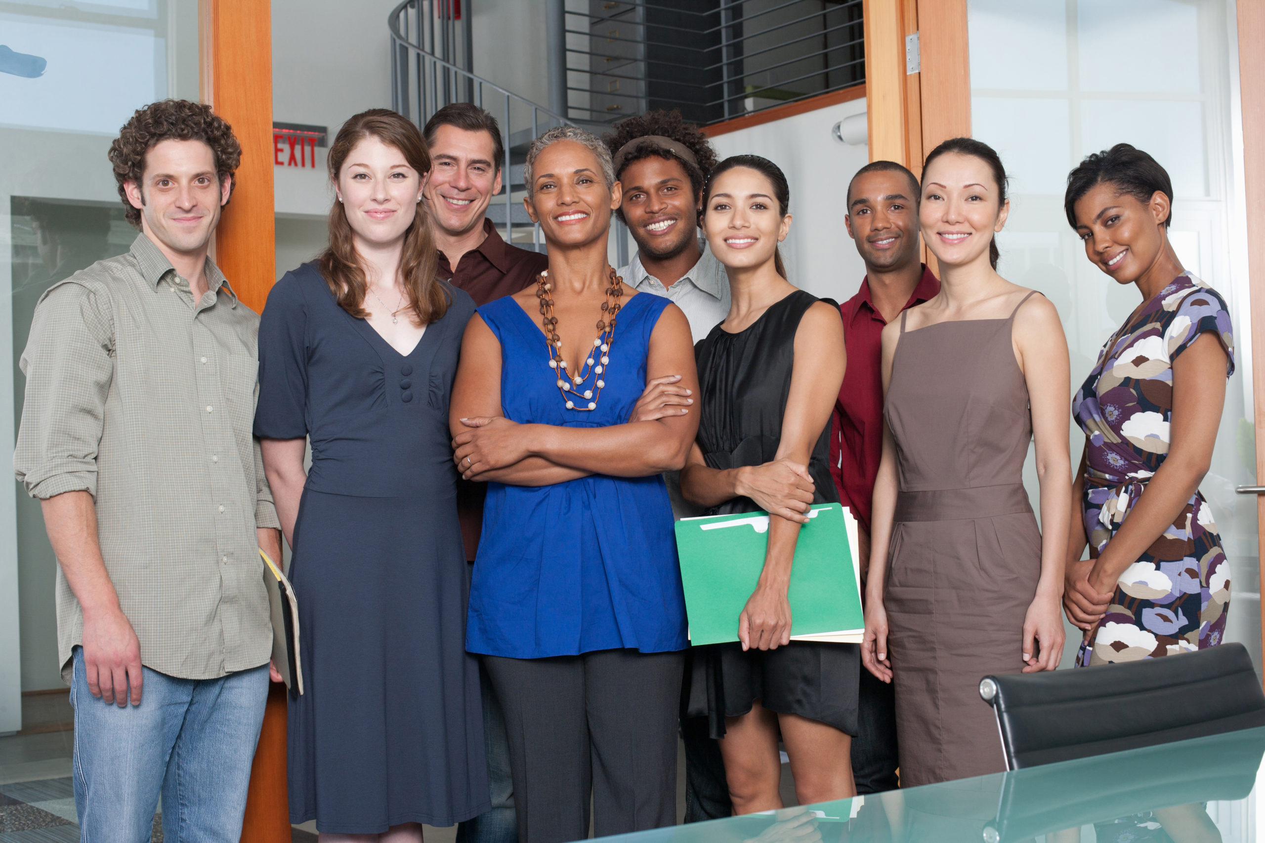 Group of coworkers in an office smiling